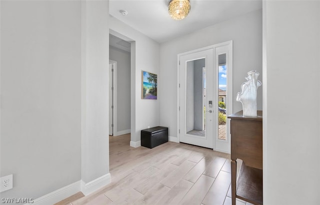 foyer entrance featuring light wood-type flooring