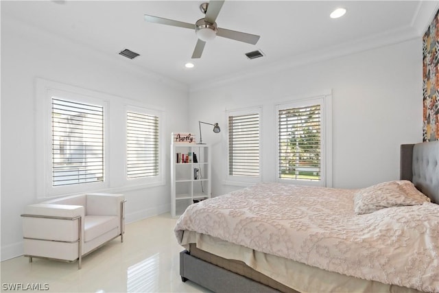 tiled bedroom with ceiling fan and ornamental molding