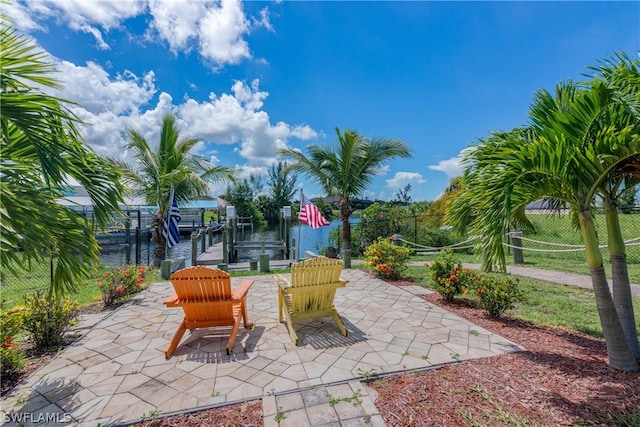 view of patio / terrace with a boat dock