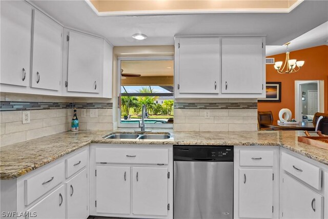 kitchen featuring sink, dishwashing machine, tasteful backsplash, and white cabinets