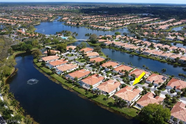 drone / aerial view featuring a water view