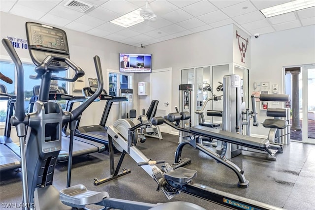 gym featuring a paneled ceiling