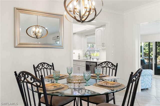 dining room featuring ornamental molding, a notable chandelier, and light tile patterned floors