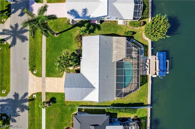 drone / aerial view featuring a water view