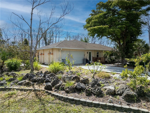 view of property exterior with a garage