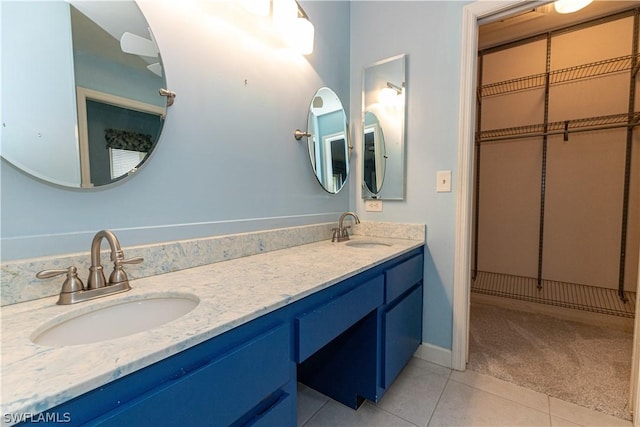 bathroom featuring tile patterned floors and vanity