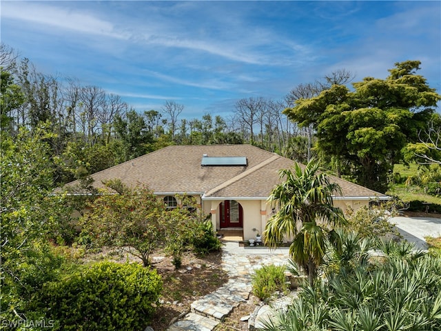 view of front of home with solar panels