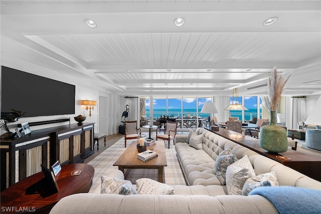 living room featuring a water view