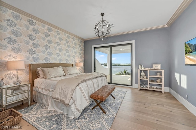 bedroom with access to outside, crown molding, a notable chandelier, and light hardwood / wood-style floors