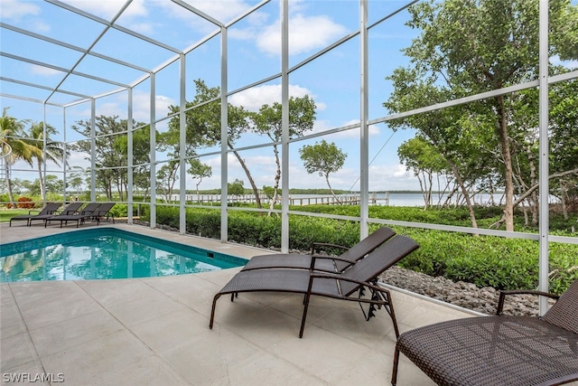 view of swimming pool featuring a patio area