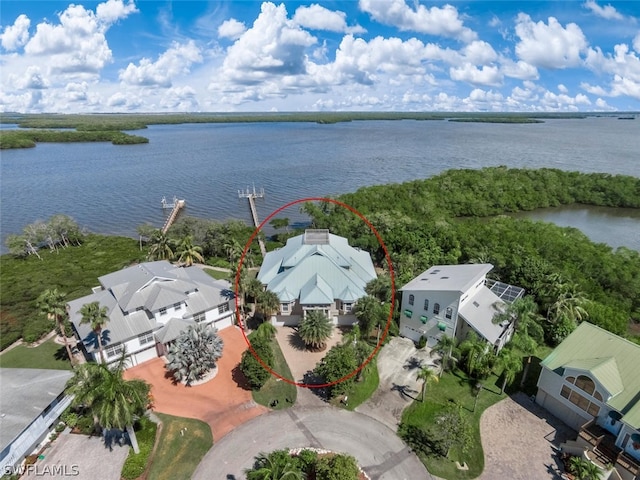 birds eye view of property featuring a water view