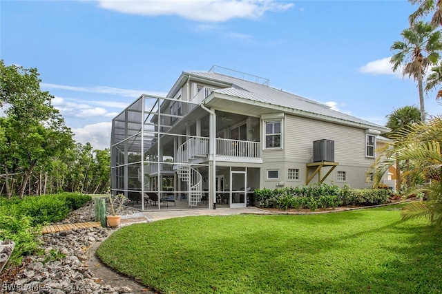 back of property featuring a yard and a patio area