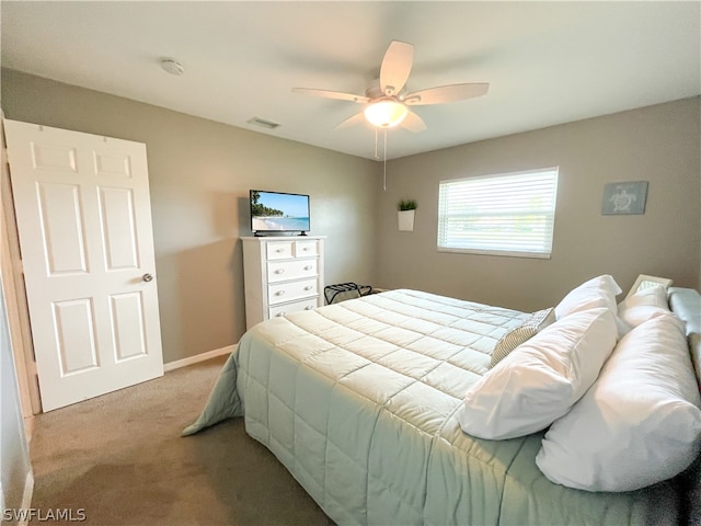 bedroom featuring ceiling fan and carpet floors