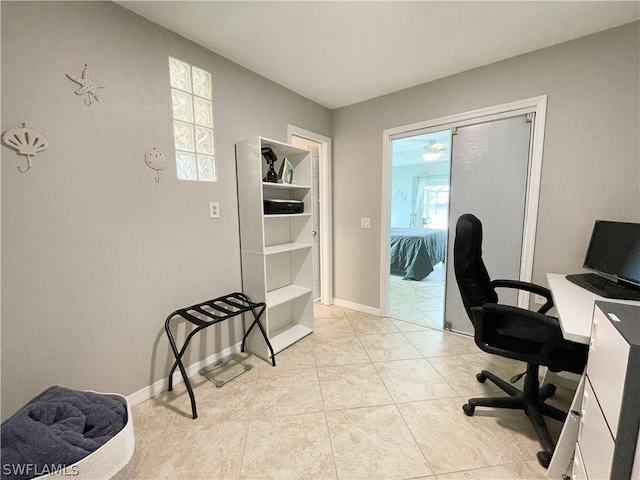 office space featuring light tile floors