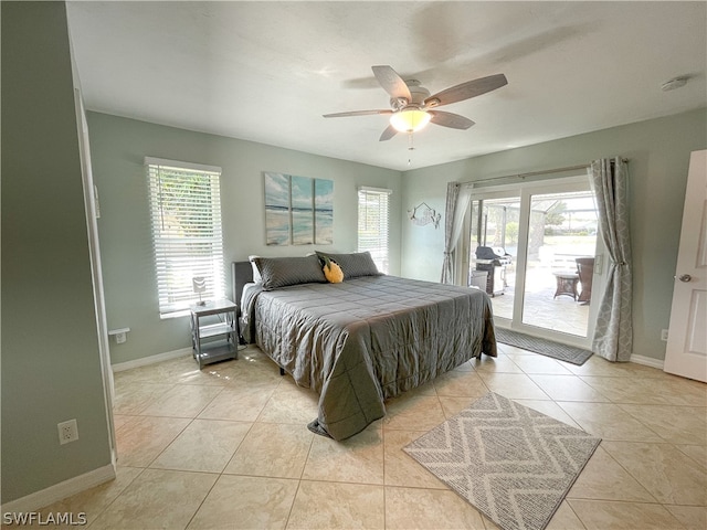 bedroom featuring light tile flooring, ceiling fan, access to exterior, and multiple windows