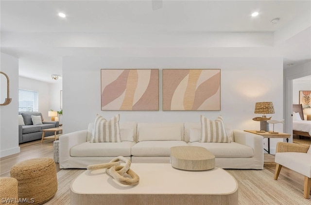 living room with light hardwood / wood-style floors