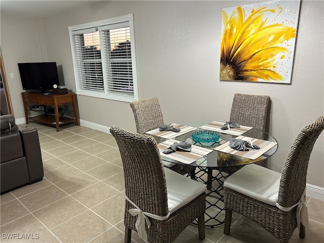 dining room with light tile patterned floors