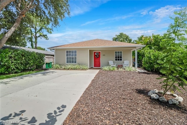 ranch-style house with covered porch