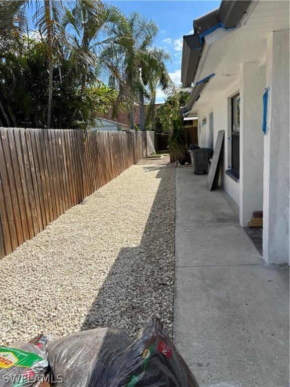 view of yard with a patio area and a fenced backyard