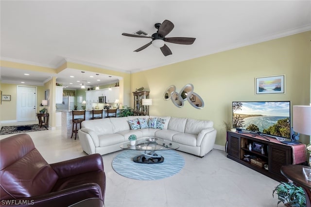 living room with ceiling fan, crown molding, and light tile floors