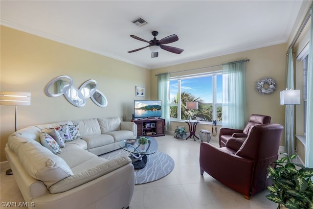 living room with ornamental molding, tile floors, and ceiling fan