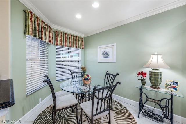 dining room featuring ornamental molding