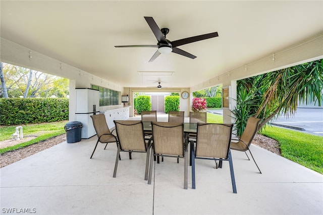 view of patio featuring ceiling fan