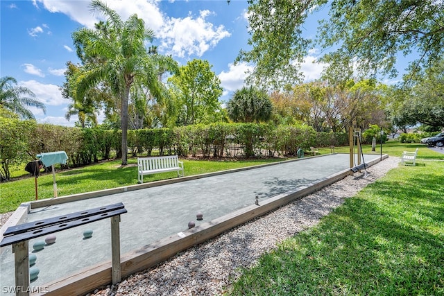 view of home's community featuring a yard