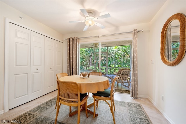 tiled dining room with ceiling fan