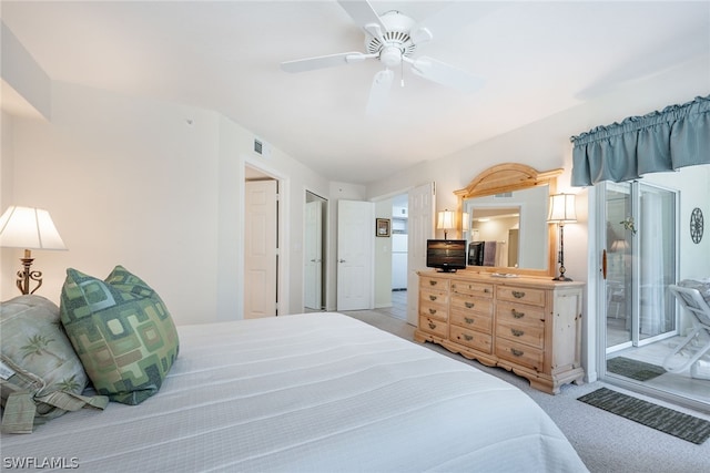 carpeted bedroom featuring ceiling fan and access to outside