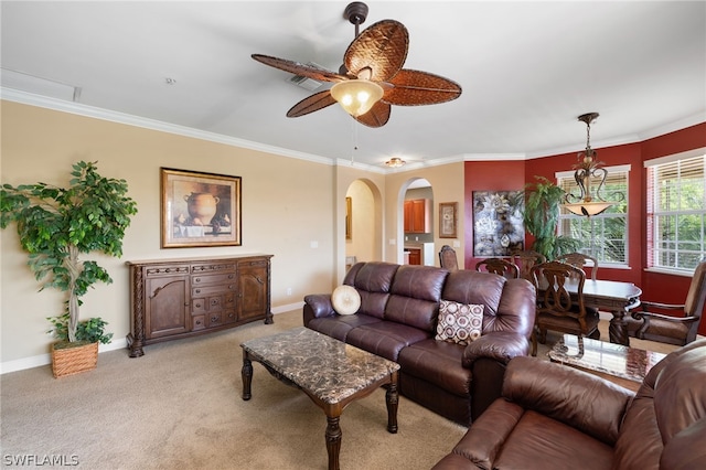 living room with light carpet, crown molding, and ceiling fan