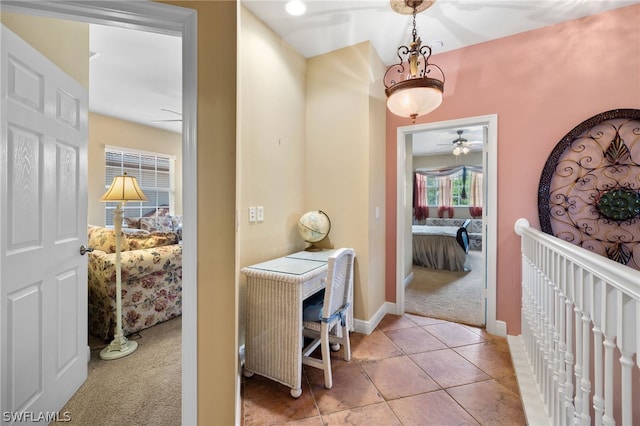 hallway with light carpet