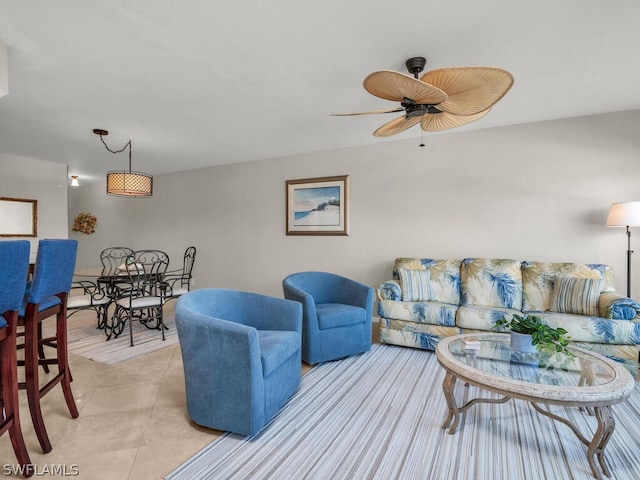 tiled living room featuring ceiling fan