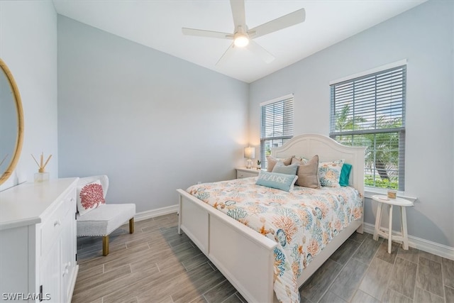 bedroom featuring ceiling fan and wood-type flooring