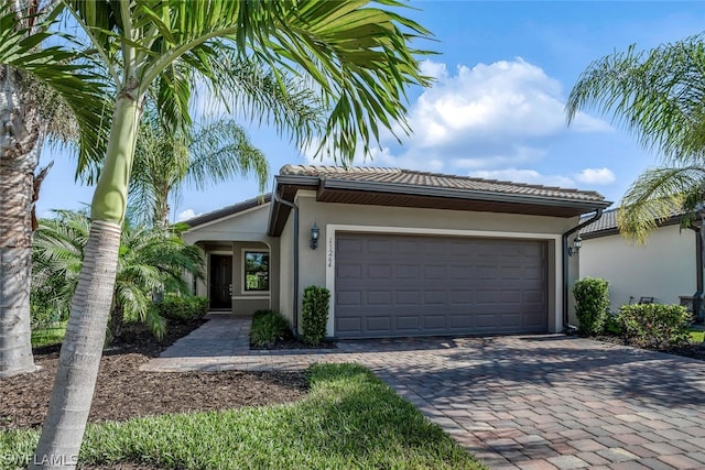 view of front of home with a garage