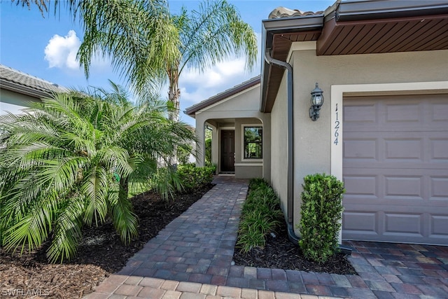 entrance to property with a garage