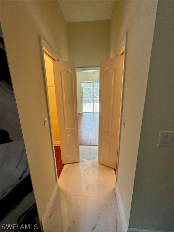 hallway featuring light wood-type flooring