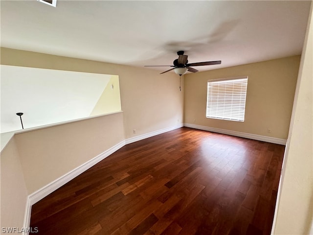 empty room with ceiling fan and wood-type flooring