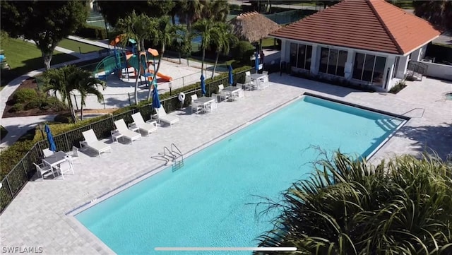 view of swimming pool featuring a patio area