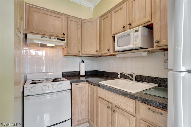 kitchen with sink, white appliances, tasteful backsplash, and crown molding