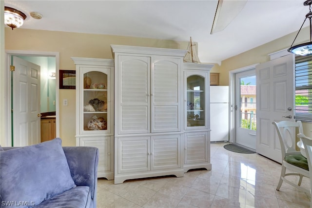 interior space featuring light tile flooring