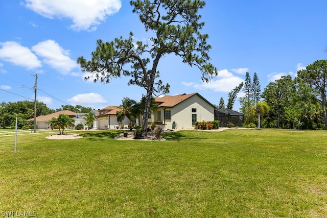 view of yard featuring a garage