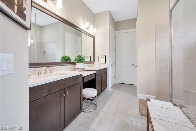 bathroom with double sink vanity and tile floors