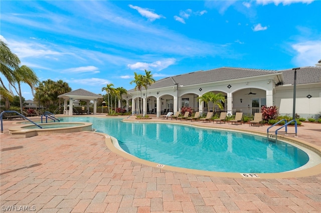 view of swimming pool featuring a patio