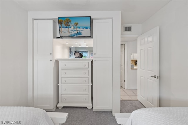 bedroom featuring light tile flooring