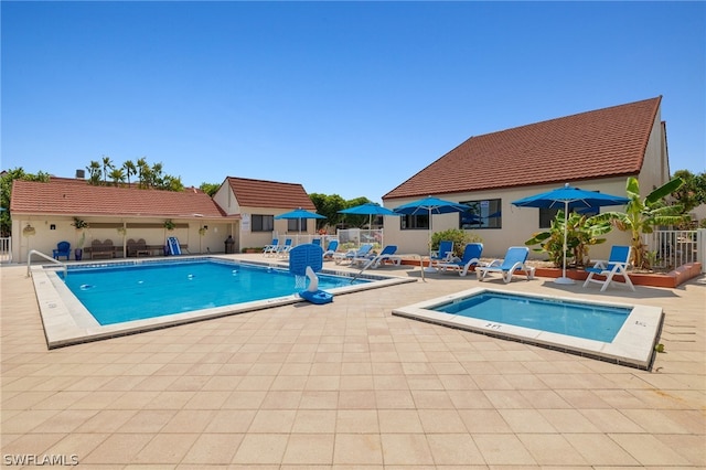 view of pool featuring a patio area