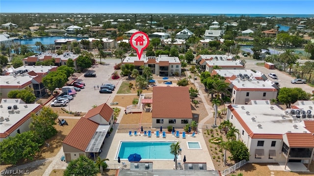 birds eye view of property featuring a water view