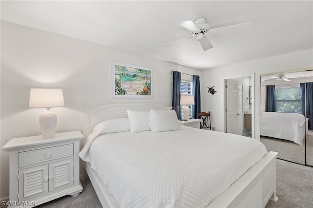 carpeted bedroom featuring ceiling fan and connected bathroom