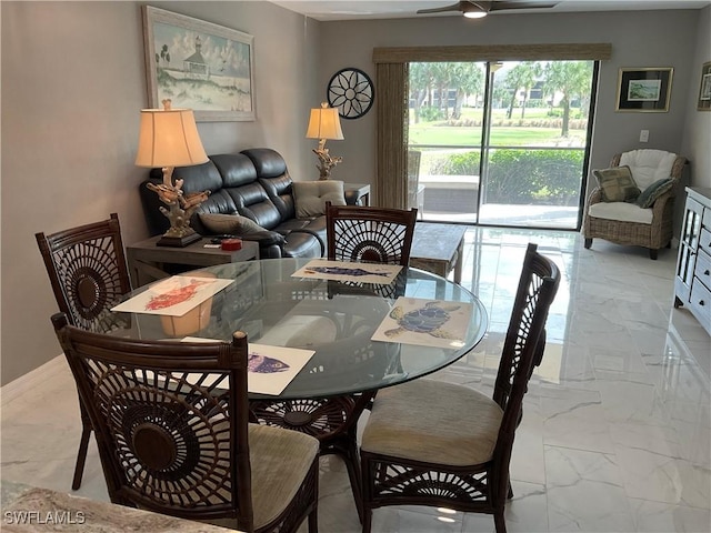 dining room featuring ceiling fan