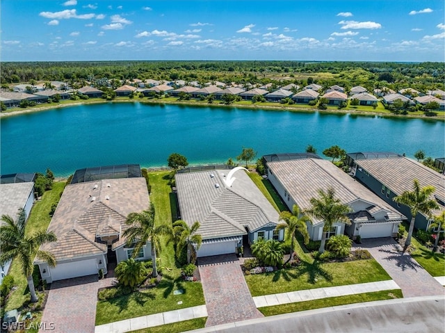 aerial view with a residential view and a water view